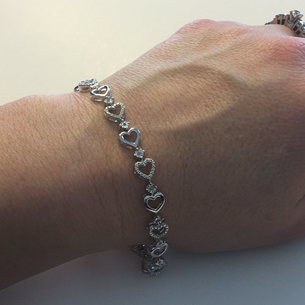 1/10 CT. T.W. White Diamond Heart Tennis Bracelet - Picture 8 of 9